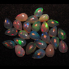 calebrated size - Ethiopian Opal - really - tope grade high quality CABOCHON - tear drops shape each pcs - have amazing - beautifull - flashy fire all around in the stone - huge size -4x6 mm approx 25 pcs -- STUNNING QUALITY - VERY VERY RARE